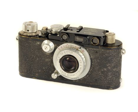 A Leica IIIf Rangefinder Camera, up-graded from Model I, black, serial no. 63830, with Leitz Elmar f/3.5 50mm lens, red dial,