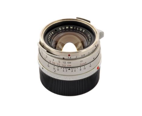 A Leitz Summilux f/1.4 35mm Lens, chrome, serial no. 1777778, body, VG, elements, VG, some very light internal haze and some 