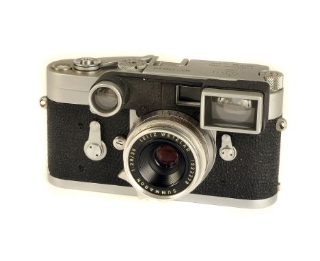 A Leica M3 Rangefinder Camera, chrome, serial no. 1155846, with Leitz Summaron f/2.8 35mm lens, with eyes, chrome, serial no.