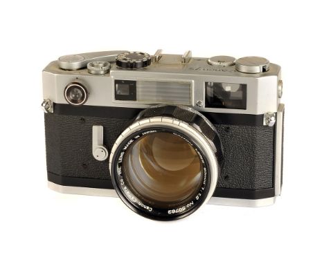 A Canon 7s Rangefinder Camera, chrome, serial no. 114947, with Canon f/1.2 50mm lens, chrome, serial no. 50763, body, VG, shu