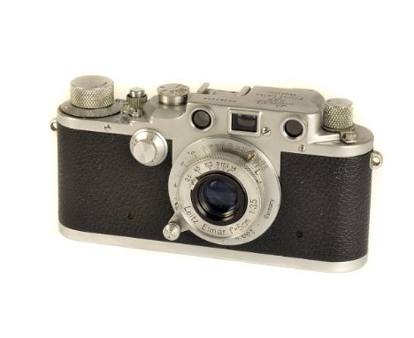 A Leica IIIc Rangefinder Camera, red blind, chrome, serial no. 362477, with Leitz Elmar f/3.5 50mm lens, chrome, serial no. 4