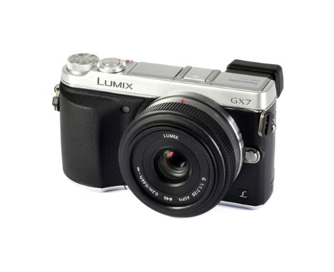 A Panasonic Lumix DMC-GX7 Digital Camera, chrome, serial no. FS3JB801034m with Lumix G f/1.7 20mm lens, grey serial no. BR9SA