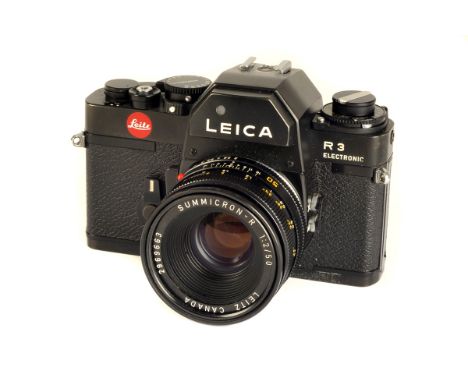 A Leica R3 Electronic SLR Camera, black, serial no. 1467012, with Leitz Summicron-R f/2 50mm lens, black, serial no. 2969663,