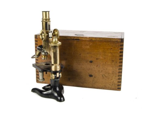 A Leitz black enamelled and lacquered brass Compound Monocular Microscope, serial no. 98337, in fitted case, F