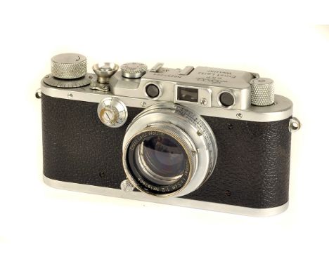 A Leica IIIa Rangefinder Camera, chrome, serial no. 257208, with Leitz Summar f/2 50mm lens, chrome, serial no. 197969, body,