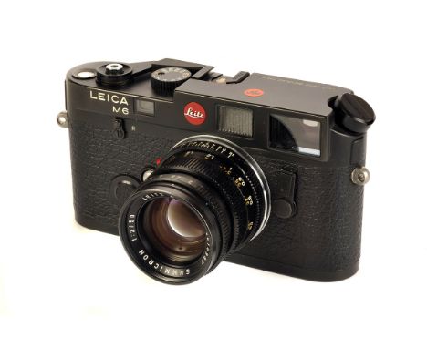 A Leica M6 Rangefinder Camera, black, serial no. 1705070, with Leitz Summicron f/2 50mm lens, black, serial no. 2610387, body