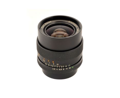 A Carl Zeiss Distagon T* f/2.8 25mm Lens, black, serial no. 6458328, body, VG, elements, VG, some very light internal haze, w