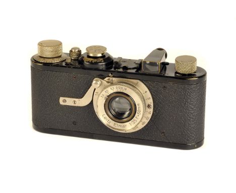 A Leica I Model A Camera, black, serial no. 28068, with Elmar f/3.5 50mm lens, body, G, shutter working, lacking one top plat