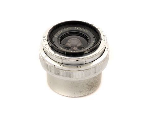 A Carl Zeiss Biogon f/4.5 21mm Lens, chrome, serial no. 1855584, body, G, elements, G-VG, some light internal haze and very l