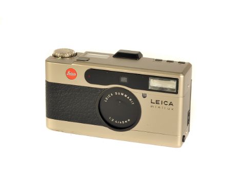 A Leica Minilux Camera, champagne, serial no. 2163330, with Leitz Summarit f/2.4 40mm, body, VG, lens, VG-E