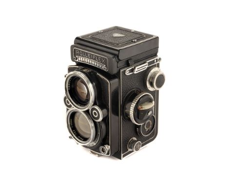 A Rolleiflex 2.8F TLR Camera, black, serial no. 2458357, with Carl Zeiss Planar f/2.8 80mm lens, serial no. 4248496, body, G,