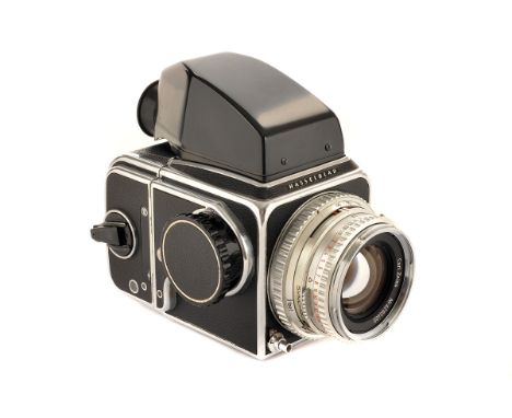 A Hasselblad 500C Camera, chrome, serial no. TU75610, with Carl Zeiss Planar f/2.8 80mm lens, chrome, serial no. 4290400, bod