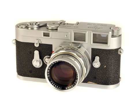 A Leica M3 Rangefinder Camera, SS, chrome, serial no. 999758, with Leitz Summicron f/2 50mm lens, with eyes, chrome, serial n