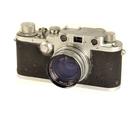 A Leica IIIc Rangefinder Camera, sharkskin vulcanite, chrome, serial no. 464195, with Canon Serenar f/1.9 50mm lens, chrome, 