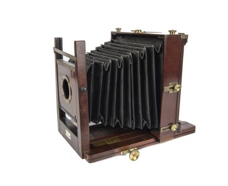 A Geo Hill Mahogany Field Camera, 8x7”, body, VG, lacking lens, with three DDS