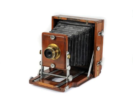 A J. Lancaster Aluminium Instantograph Mahogany Camera, 4½x6¼, with J. Lancaster f/10 brass lens, body, G-VG, some brass fitt