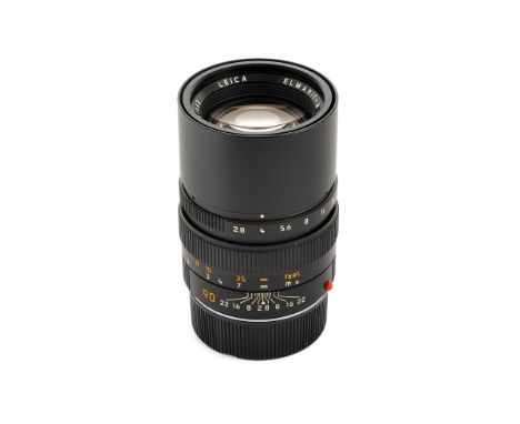 A Leitz Elmarit-M f/2.8 90mm Lens, E46, black, serial no. 3711033, body, VG-E, elements, E, very light dust, with maker’s cap