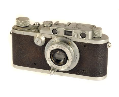 A Leica IIIa Rangefinder Camera, chrome, serial no. 226062, with Leitz Elmar f/3.5 50mm lens, chrome, serial no. 568615, body