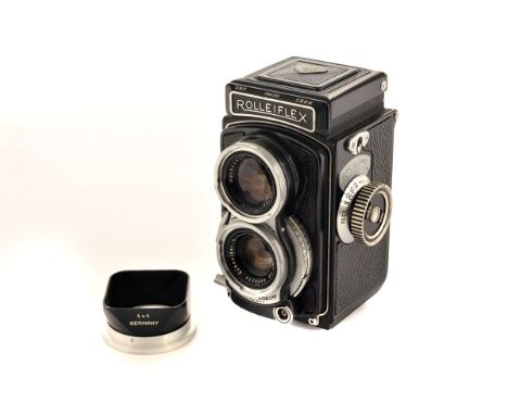 A Post-War Rolleiflex 4x4 Baby TLR Camera, black, serial no. 2064293, with Schneider Xenar f/3.5 60mm lens, serial no. 893023