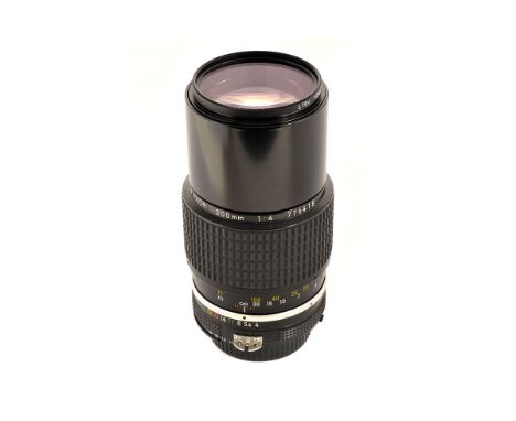 A Nikon Nikkor Ai f/4 200mm Lens, black, serial no. 776418, body, VG-E, elements, VG, some very light internal haze