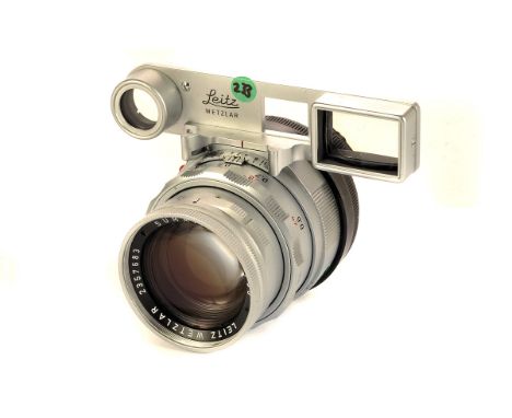 A Leitz Summicron f/2 50mm Lens, with eyes, chrome, serial no. 2357683, body, G-VG, elements, VG, some light internal haze