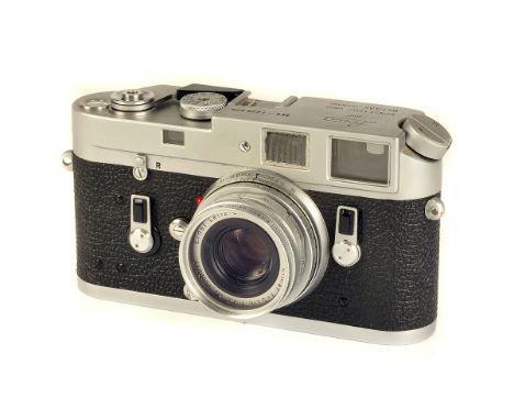 A Leica M4 Rangefinder Camera, chrome, serial no. 1229825, with Leitz Elmar f/2.8 50mm lens, chrome, serial no. 1590817, body