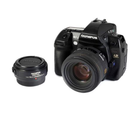 An Olympus E-3 Digital SLR Camera, black, serial no. D70502155, with Sigma DC HSM f/1.4 30mm lens, black, serial no. 1016597,