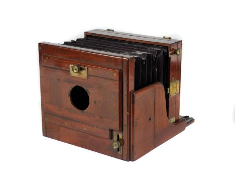 An Unmarked Mahogany Tailboard Camera, with septum slots to rear and sliding front, body, G, lacking lens