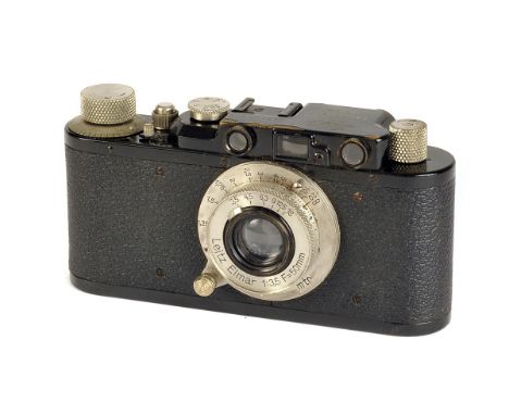 A Leica II Rangefinder Camera, black, serial no. 67036, with Leitz Elmar f/3.5 50mm lens, nickel, body, G, shutter working, l