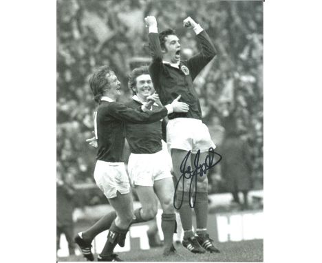 Joe Jordan signed 10x8 b/w football photo pictured celebrating while playing for Scotland. Supplied from stock of www.sportsi