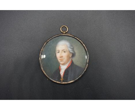 English School,&nbsp;18th century, a head and shoulders portrait miniature of a gentleman, on card, 5.8cm diameter. 