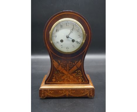 A late Victorian mahogany and inlaid balloon mantel clock,&nbsp;30cm high, with pendulum.&nbsp; 