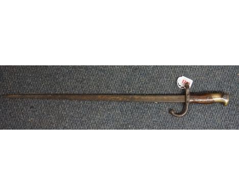 A World War I French gras bayonet, having 52cm blade, no scabbard. IN-HOUSE SHIPPING IS NOT AVAILABLE ON THIS ITEM. 