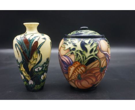 Two Moorcroft vases, comprising: 'a Vegetable Patch' pattern jar and cover, 15cm high; and a 'Bullrushes' pattern vase, 16cm 