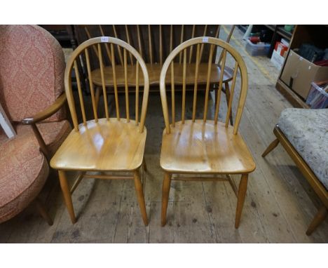 A pair of vintage Ercol dining chairs.&nbsp; 
