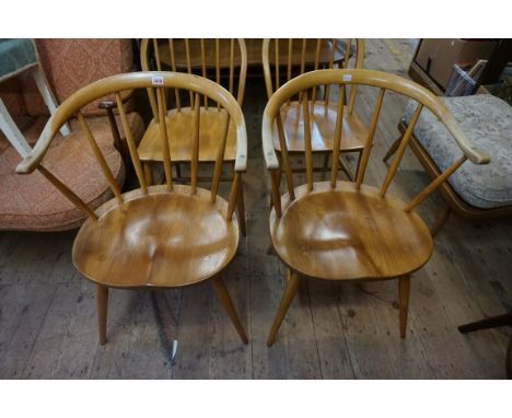 A pair of vintage Ercol 'Cowhorn' armchairs, model 338. 