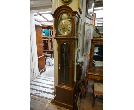 A good reproduction walnut longcase clock, the 10in arched dial inscribed 'Canham, London', 198cm high, with pendulum and thr