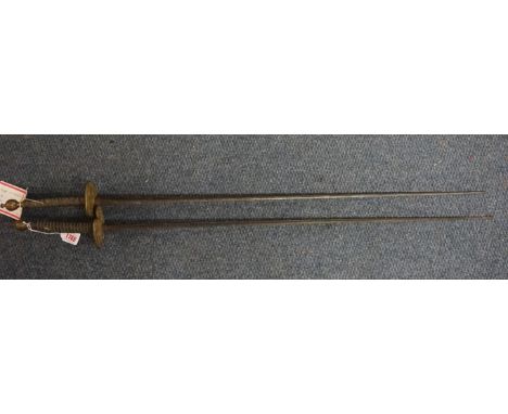 Two Angelos School of Arms fencing swords, one indistinctly inscribed to blade 'Won by C T Dent, Eton 1869', the other also i