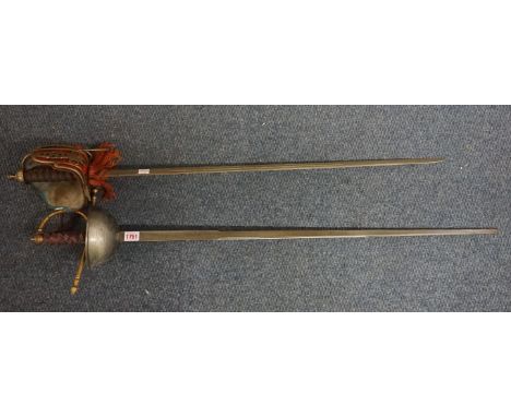 Two reproduction swords. IN HOUSE SHIPPING IS NOT AVAILABLE ON THIS ITEM. 