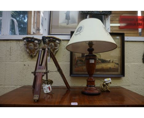 A novelty brass mounted tripod style table lamp,&nbsp;total height 41cm; together with one other table lamp.&nbsp;