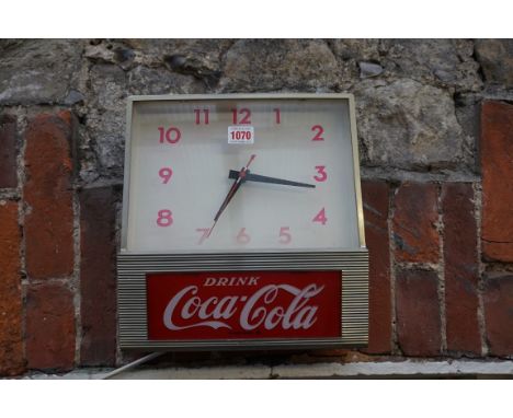 Advertising: a vintage Coca-Cola electric wall clock, by Synchron, 28cm wide. 