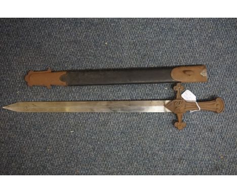 A Victorian volunteer bandsman's sword and scabbard, 45.5cm long. IN-HOUSE SHIPPING IS NOT AVAILABLE ON THIS ITEM.  