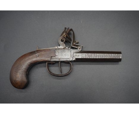 An 18th century flint lock pocket pistol, by 'Dally, Paris', having 9cm octagonal barrel with walnut grip, overall length 21c