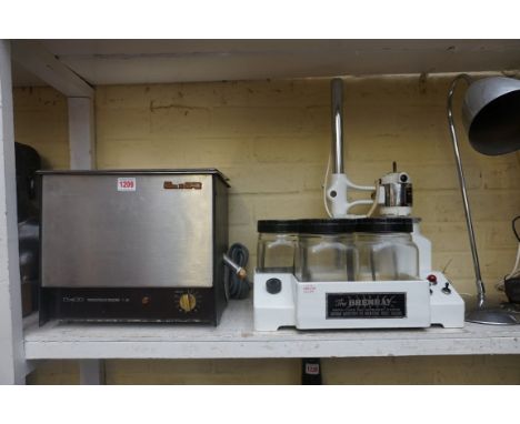A 'Brenray' watch, clock and instrument cleaner; together with an L &amp; R transistor/ultrasonic T-28 example. 