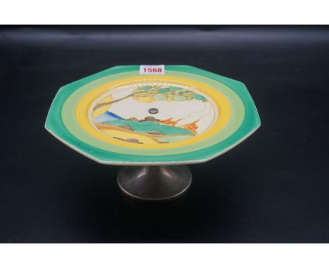 A Clarice Cliff 'Secrets' pattern octagonal plate, on plated metal foot,&nbsp;22cm wide, (crazed). 