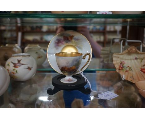 A Royal Worcester cabinet cup and saucer,&nbsp;circa 1919, painted with highland cattle, by Harry Stinton, signed, the cup 6c