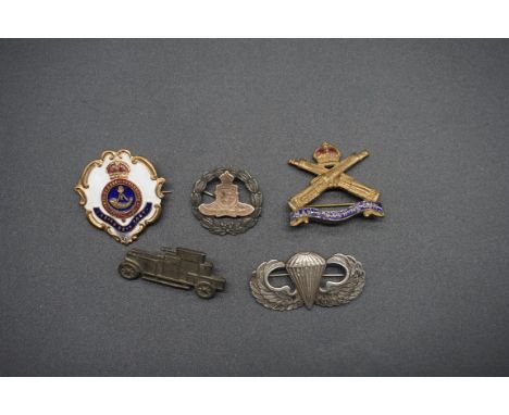 A World War II US Army Parachutist badge, stamped sterling, 4cm wide; together with a Dreadnought sweetheart badge; and other