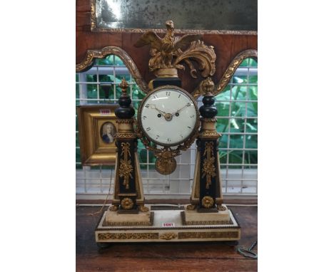 A good French Empire gilt metal, marble and slate mantel portico clock,&nbsp;53cm high, with pendulum. 