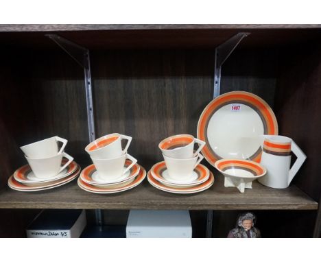 A Clarice Cliff for Wilkinson Ltd Art Deco pottery part tea service, painted with Liberty Stripes, of conical form.&nbsp; 