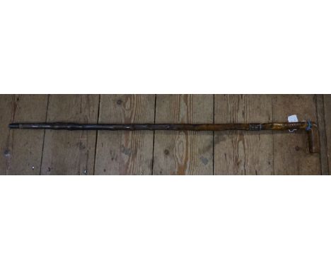 An antique sword stick,&nbsp;with Damascus quatreform 34cm blade. 